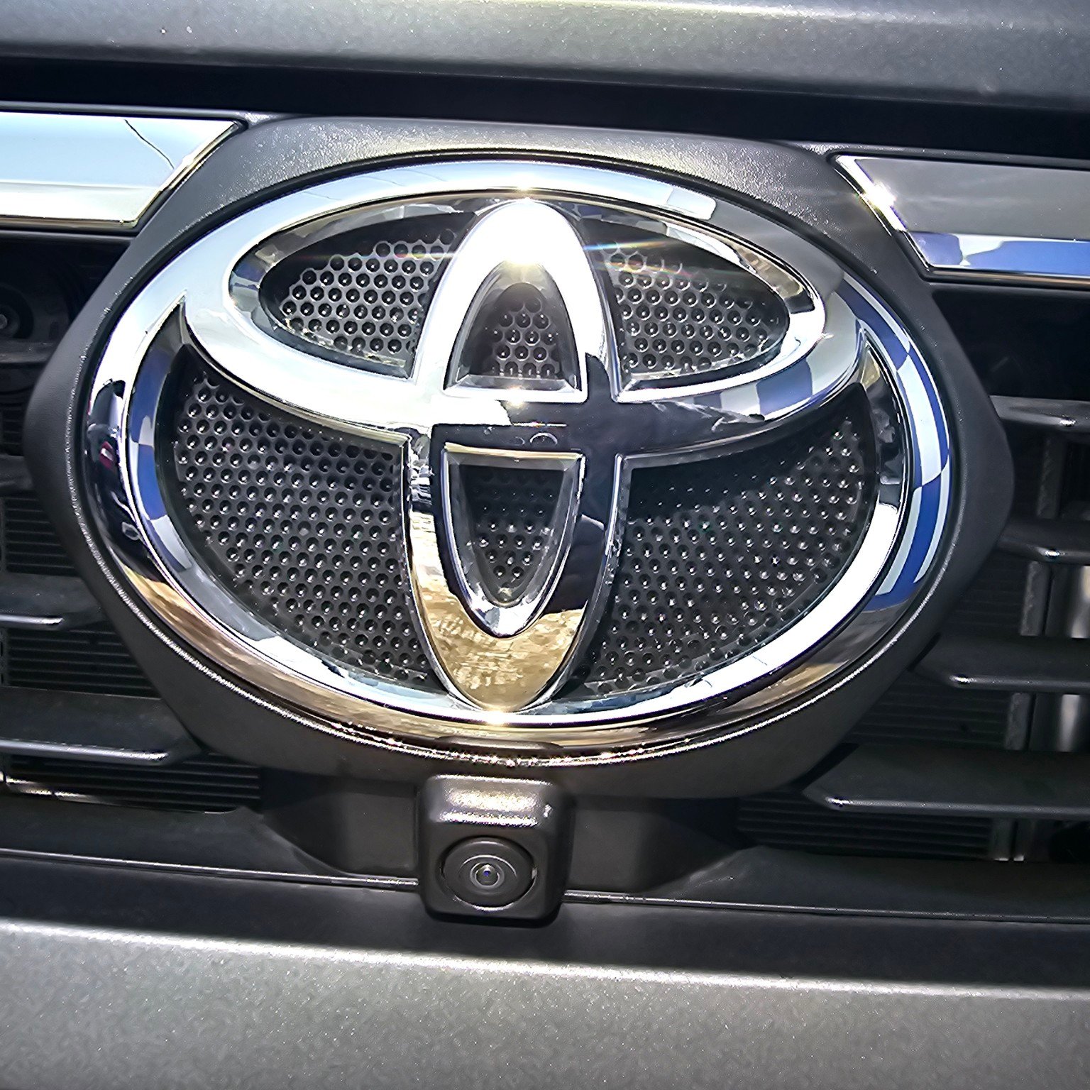 Toyota Hilux 2021 front logo and camera detail